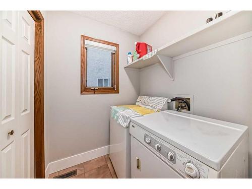 103 Hawktree Close Nw, Calgary, AB - Indoor Photo Showing Laundry Room