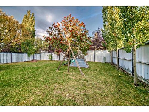 103 Hawktree Close Nw, Calgary, AB - Outdoor With Backyard