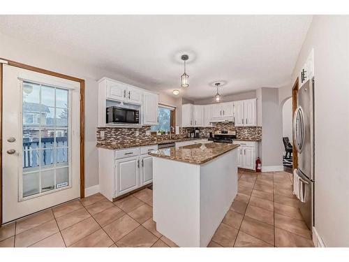 103 Hawktree Close Nw, Calgary, AB - Indoor Photo Showing Kitchen With Upgraded Kitchen