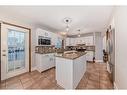 103 Hawktree Close Nw, Calgary, AB  - Indoor Photo Showing Kitchen With Upgraded Kitchen 