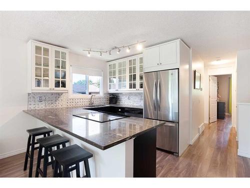 13 Edgeford Road Nw, Calgary, AB - Indoor Photo Showing Kitchen With Stainless Steel Kitchen