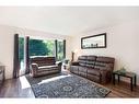 13 Edgeford Road Nw, Calgary, AB  - Indoor Photo Showing Living Room 