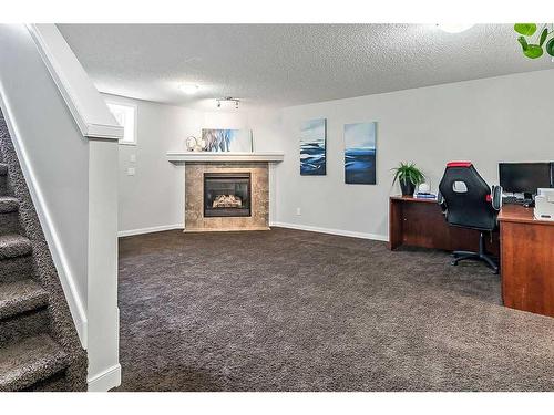 68 Auburn Bay Crescent Se, Calgary, AB - Indoor With Fireplace