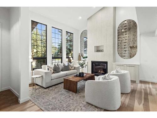 3355 Oakwood Drive Sw, Calgary, AB - Indoor Photo Showing Living Room With Fireplace