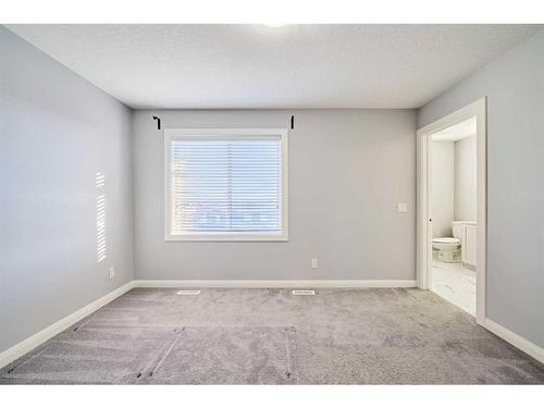 14 Evanscrest Heights Nw, Calgary, AB - Indoor Photo Showing Other Room