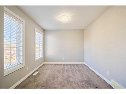 14 Evanscrest Heights Nw, Calgary, AB - Indoor Photo Showing Other Room