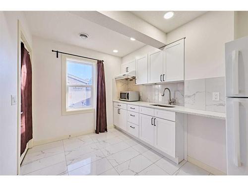 14 Evanscrest Heights Nw, Calgary, AB - Indoor Photo Showing Kitchen