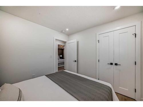 128 Cantrell Place Sw, Calgary, AB - Indoor Photo Showing Bedroom