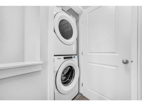 450 Canals Crossing Sw, Airdrie, AB - Indoor Photo Showing Laundry Room