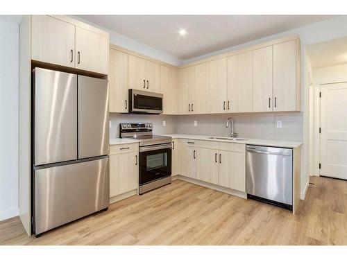 6213-200 Seton Circle Se, Calgary, AB - Indoor Photo Showing Kitchen With Stainless Steel Kitchen