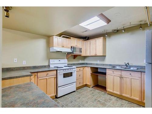 2224 37 Street Sw, Calgary, AB - Indoor Photo Showing Kitchen With Double Sink