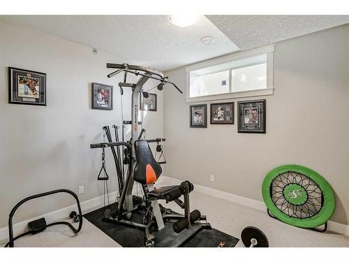 73 Tusslewood Heights Nw, Calgary, AB - Indoor Photo Showing Gym Room