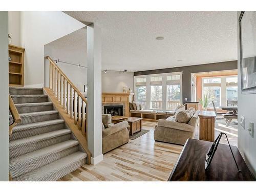 73 Tusslewood Heights Nw, Calgary, AB - Indoor Photo Showing Living Room With Fireplace