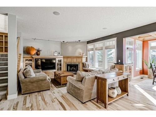 73 Tusslewood Heights Nw, Calgary, AB - Indoor Photo Showing Living Room With Fireplace