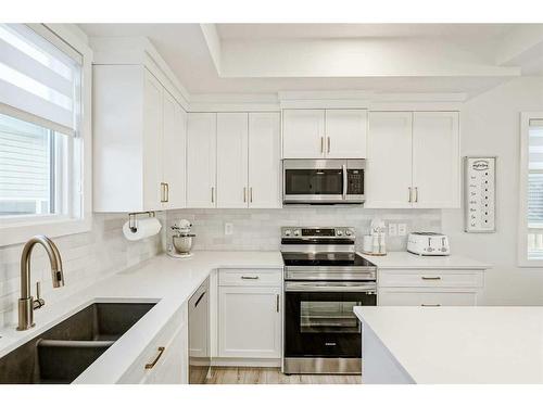 255 Creekstone Way Sw, Calgary, AB - Indoor Photo Showing Kitchen With Double Sink With Upgraded Kitchen