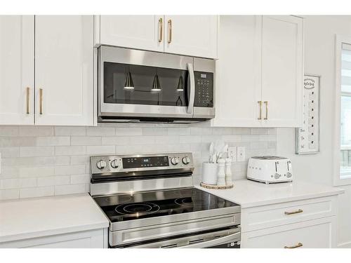 255 Creekstone Way Sw, Calgary, AB - Indoor Photo Showing Kitchen With Upgraded Kitchen