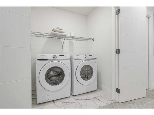 255 Creekstone Way Sw, Calgary, AB - Indoor Photo Showing Laundry Room