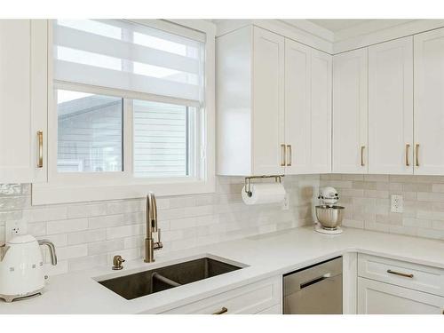 255 Creekstone Way Sw, Calgary, AB - Indoor Photo Showing Kitchen With Double Sink