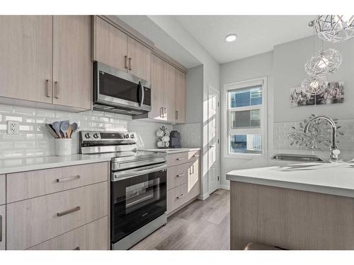 116-80 Carrington Plaza Nw, Calgary, AB - Indoor Photo Showing Kitchen