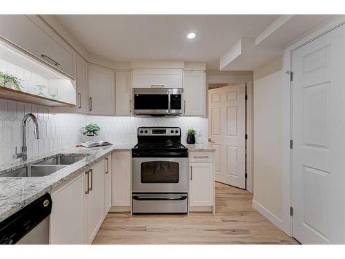 1732 Valleyview Road Ne, Calgary, AB - Indoor Photo Showing Kitchen With Double Sink With Upgraded Kitchen