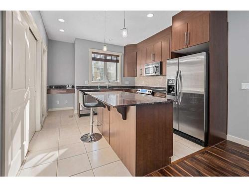 47 West Springs Lane Sw, Calgary, AB - Indoor Photo Showing Kitchen With Stainless Steel Kitchen With Upgraded Kitchen