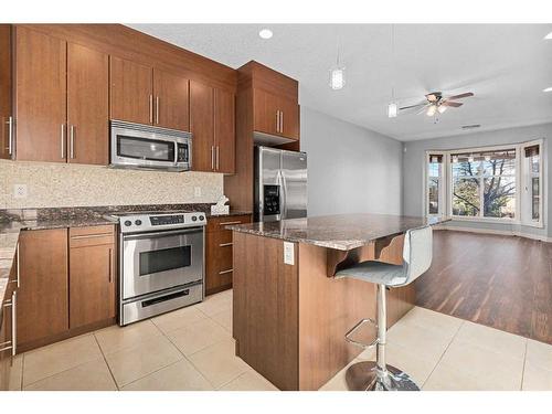 47 West Springs Lane Sw, Calgary, AB - Indoor Photo Showing Kitchen With Stainless Steel Kitchen