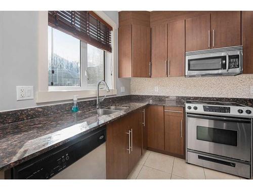 47 West Springs Lane Sw, Calgary, AB - Indoor Photo Showing Kitchen With Stainless Steel Kitchen With Double Sink