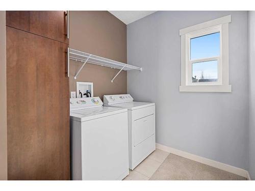 47 West Springs Lane Sw, Calgary, AB - Indoor Photo Showing Laundry Room