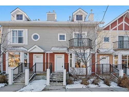 47 West Springs Lane Sw, Calgary, AB - Outdoor With Balcony With Facade