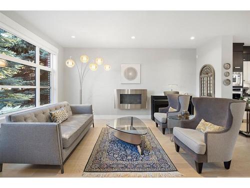 728 36 Street Nw, Calgary, AB - Indoor Photo Showing Living Room With Fireplace