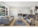 728 36 Street Nw, Calgary, AB  - Indoor Photo Showing Living Room With Fireplace 