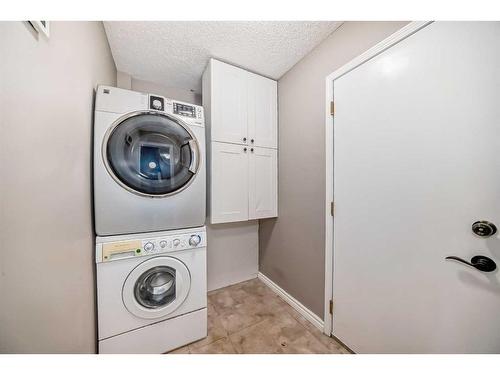 27 Canoe Circle Sw, Airdrie, AB - Indoor Photo Showing Laundry Room