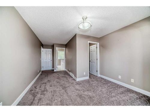 27 Canoe Circle Sw, Airdrie, AB - Indoor Photo Showing Other Room