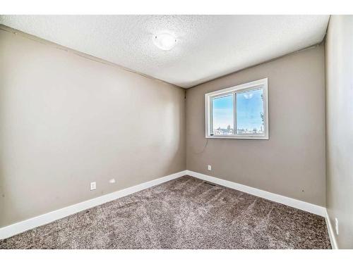 27 Canoe Circle Sw, Airdrie, AB - Indoor Photo Showing Other Room