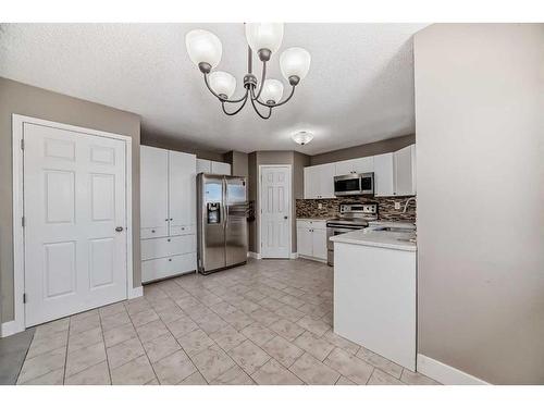 27 Canoe Circle Sw, Airdrie, AB - Indoor Photo Showing Kitchen