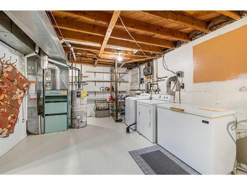 18 Harmon Place Sw, Calgary, AB - Indoor Photo Showing Laundry Room