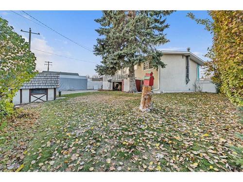 18 Harmon Place Sw, Calgary, AB - Outdoor