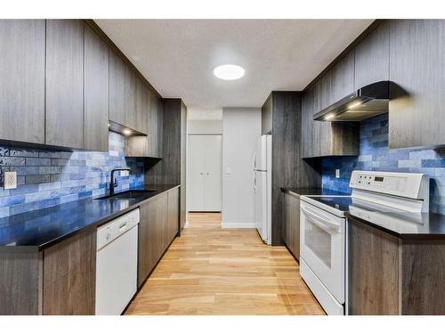 11 Midbend Crescent Se, Calgary, AB - Indoor Photo Showing Kitchen