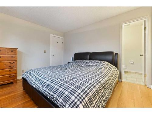 11 Midbend Crescent Se, Calgary, AB - Indoor Photo Showing Bedroom