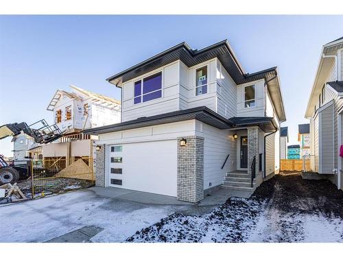 53 Versant Point Sw, Calgary, AB - Outdoor With Facade