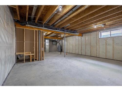 53 Versant Point Sw, Calgary, AB - Indoor Photo Showing Basement