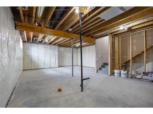 53 Versant Point Sw, Calgary, AB - Indoor Photo Showing Basement