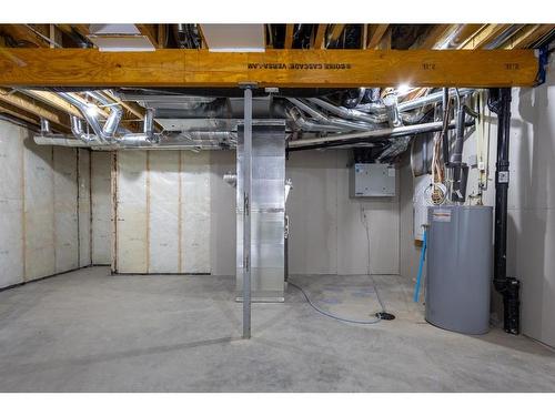 53 Versant Point Sw, Calgary, AB - Indoor Photo Showing Basement