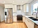 25 Edgeford Way Nw, Calgary, AB  - Indoor Photo Showing Kitchen With Double Sink With Upgraded Kitchen 