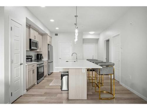 411-40 Carrington Plaza Nw, Calgary, AB - Indoor Photo Showing Kitchen With Upgraded Kitchen