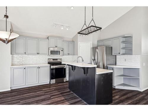 154 Prestwick Landing Se, Calgary, AB - Indoor Photo Showing Kitchen With Stainless Steel Kitchen With Upgraded Kitchen