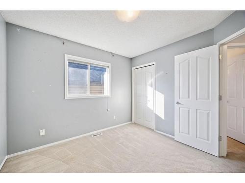 154 Prestwick Landing Se, Calgary, AB - Indoor Photo Showing Other Room