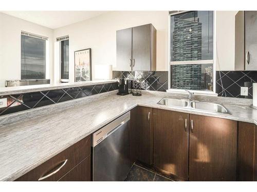 1801-1053 10 Street Sw, Calgary, AB - Indoor Photo Showing Kitchen With Double Sink