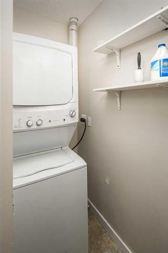 1801-1053 10 Street Sw, Calgary, AB - Indoor Photo Showing Laundry Room