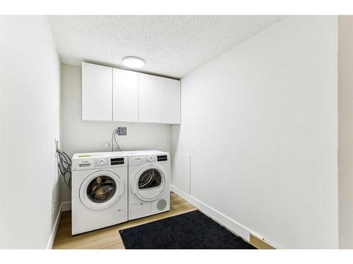 1101-2520 Palliser Drive Sw, Calgary, AB - Indoor Photo Showing Laundry Room